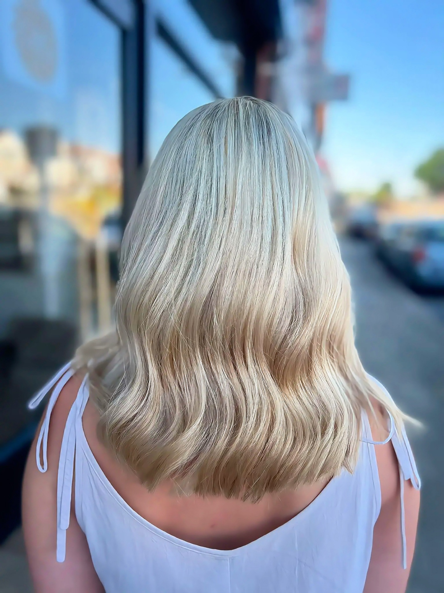 Cool creamy blonde balayage with soft grow-out